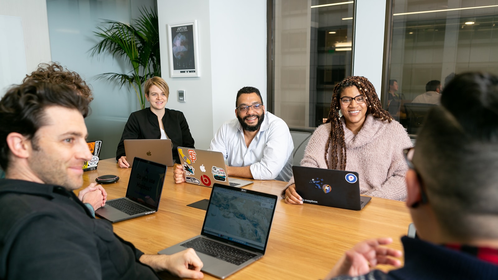 Colleagues in a working session, representing committee composition and decision rights