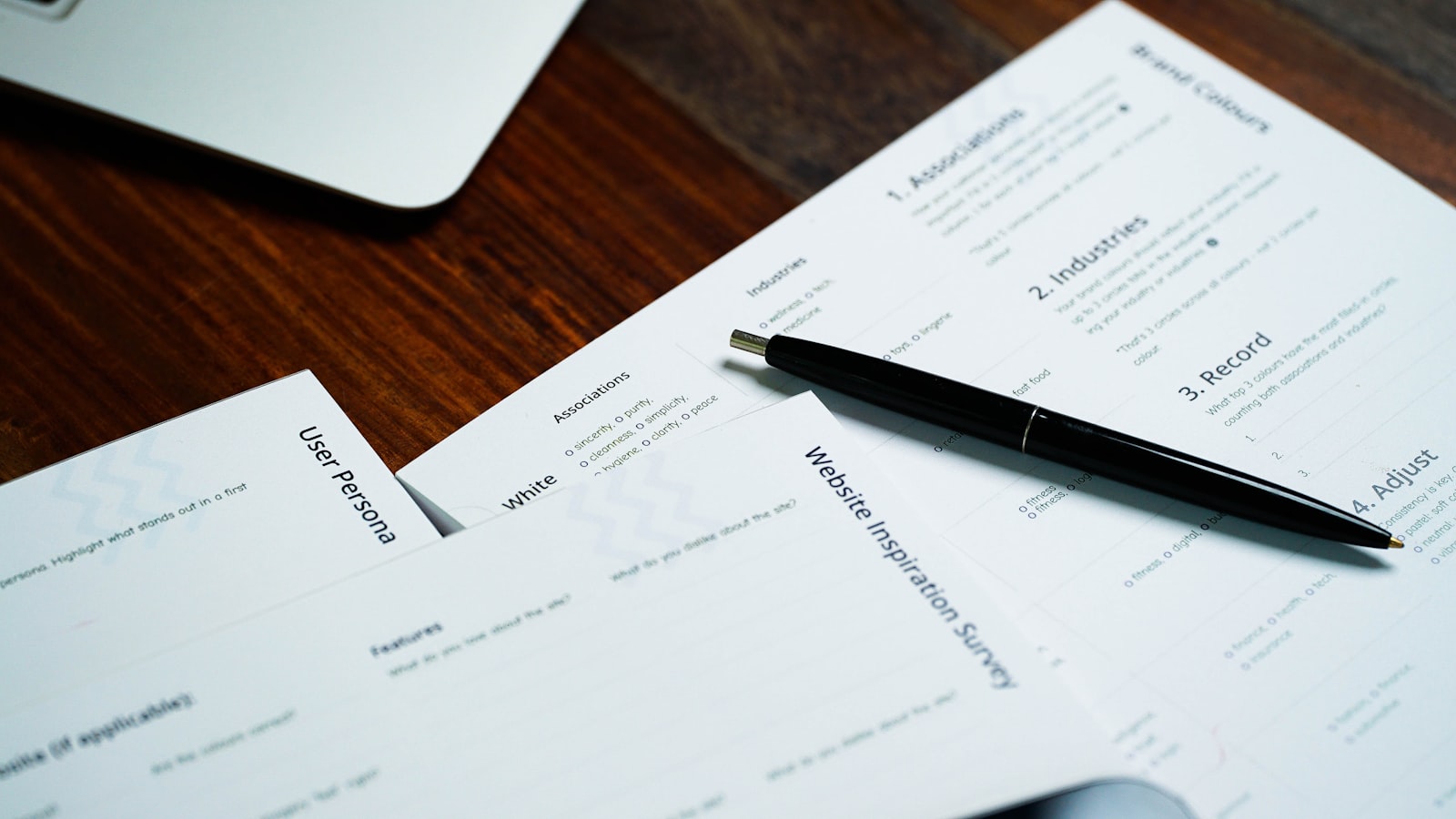A pen resting on a stack of documents, representing a structured readiness sprint